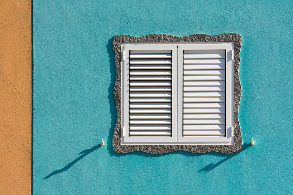 White wooden plantation shutters