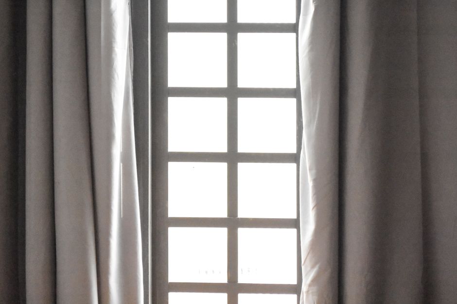 Fabric roman shades window